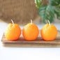 Ensemble de 3 bougies en forme d'agrumes